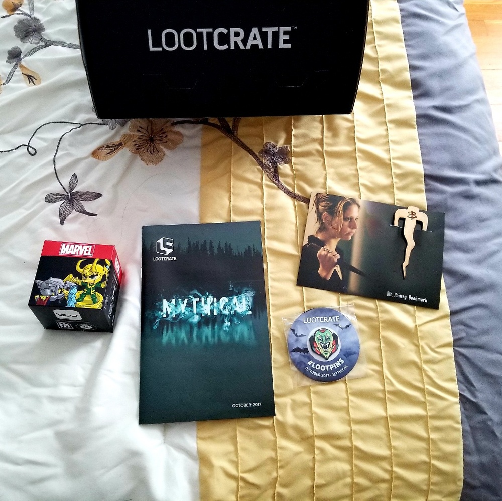 Lootcrate with Marvel and a Buffy Book Mark